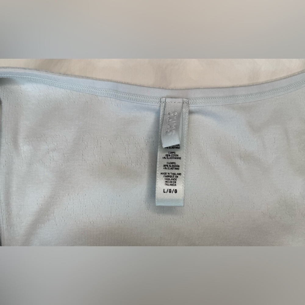 SKIMS LOGO POINTELLE SLEEP SET
FROST (L) - Picture 8 of 10